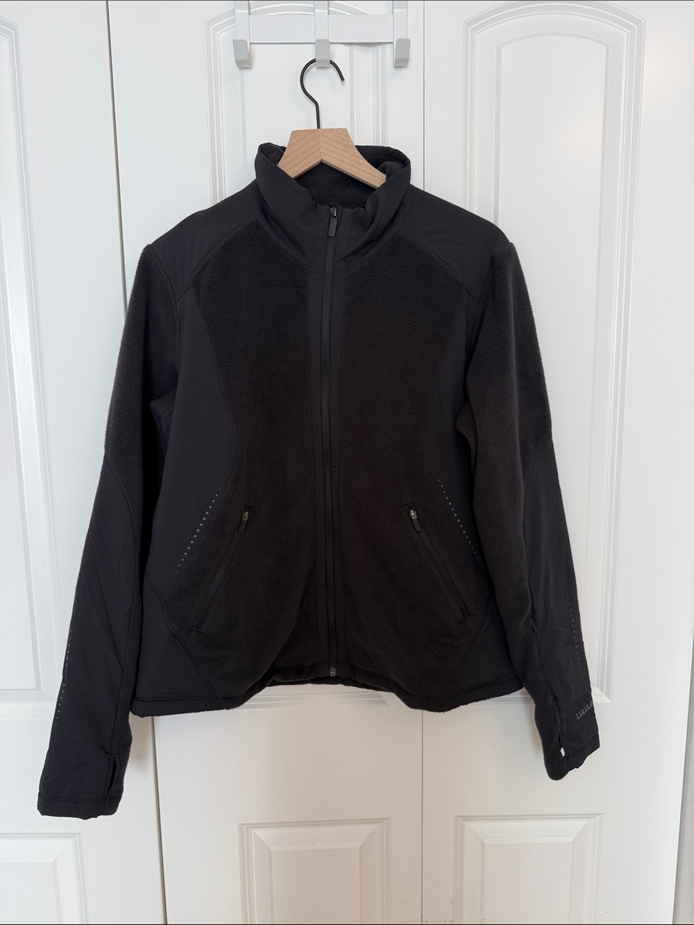 Women’s Lululemon Fleece Zip Jacket, black, size 10.